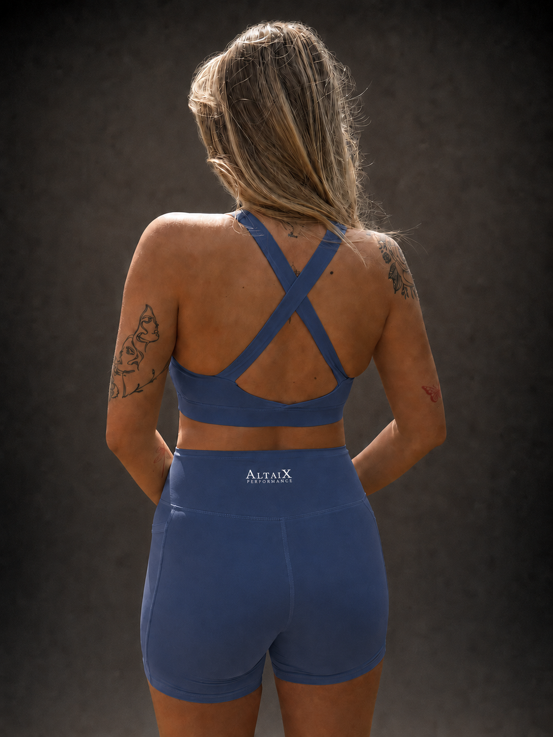 AltaiX Women's Performance Sports Bra & Shorts Set in Summit Blue with a supportive body-contouring fit, high-waisted shorts with side pockets and breathable four-way stretch fabric for gym training, HYROX, running and everyday wear.