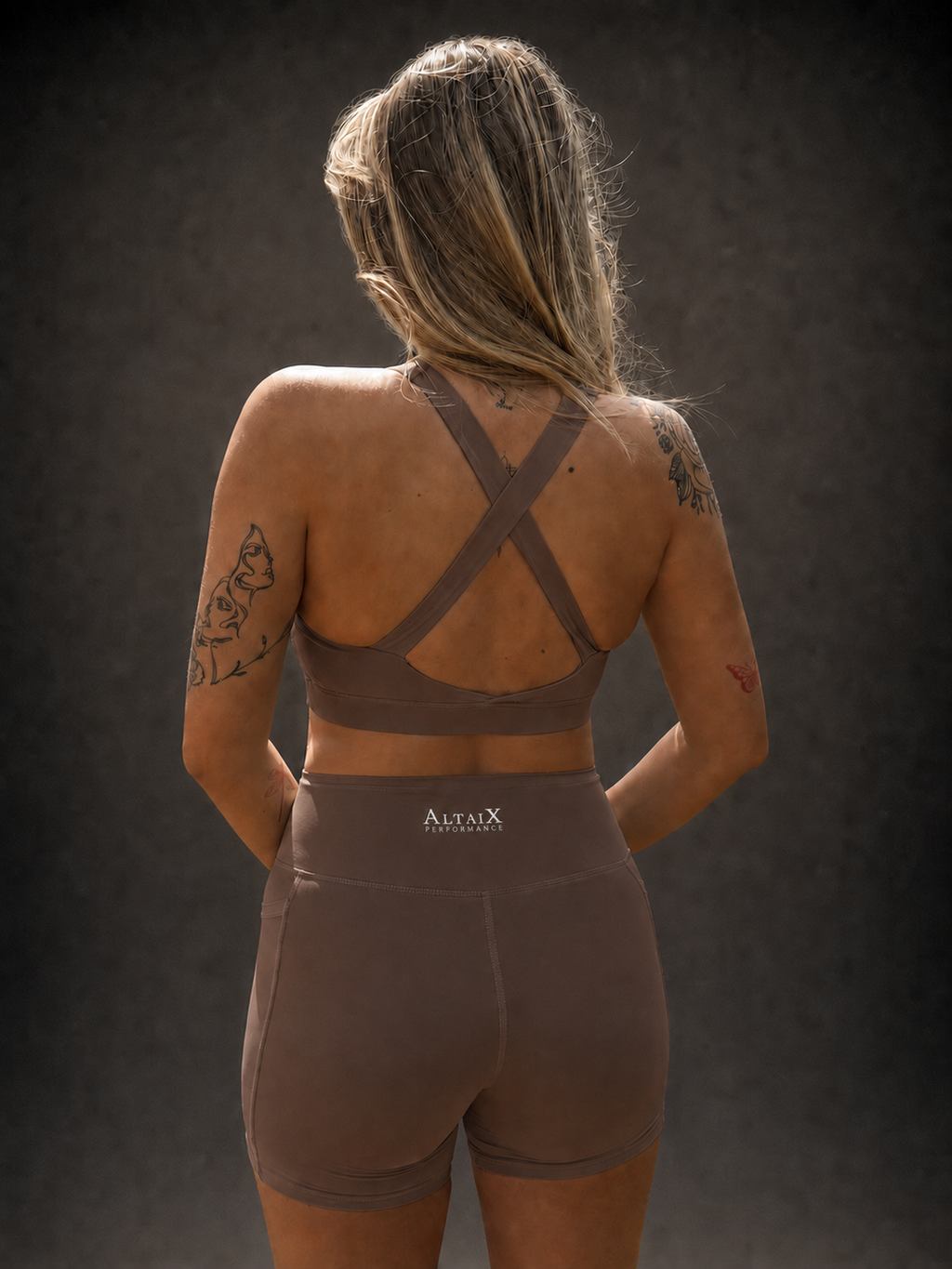 AltaiX Women's Performance Sports Bra & Shorts Set in Terra Brown with a supportive body-contouring fit, high-waisted shorts with side pockets and breathable four-way stretch fabric for gym training, HYROX, running and everyday wear.