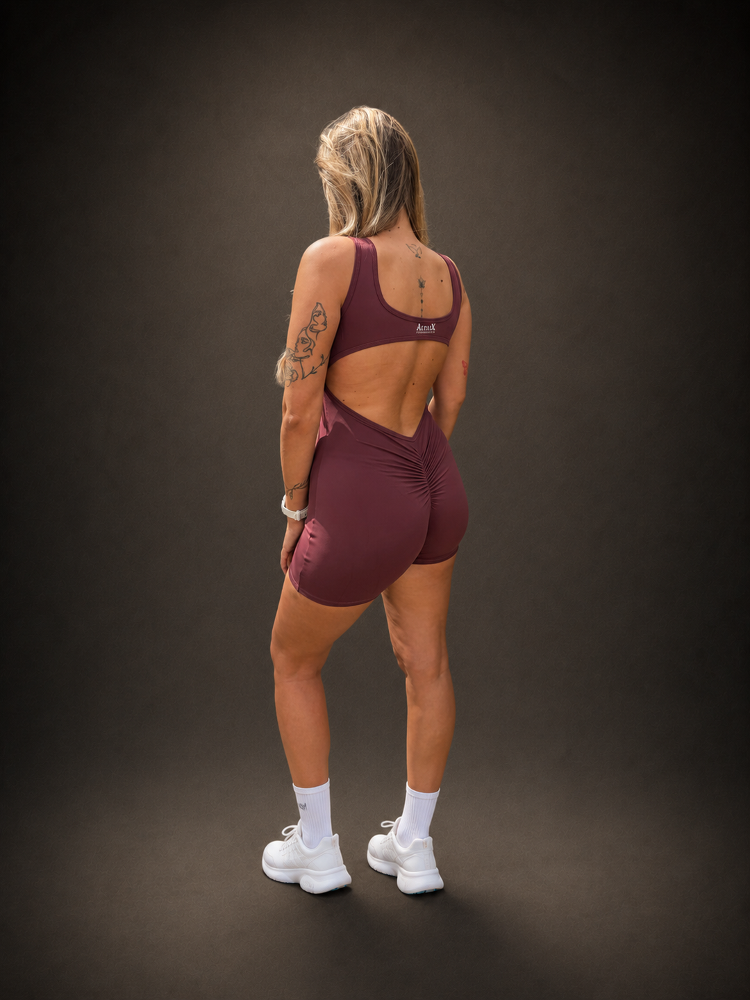 AltaiX Women's Performance Short One Piece in Burgundy Peak with a supportive body-contouring fit, breathable quick-drying four-way stretch fabric and streamlined design for gym training, HYROX, running and everyday wear.